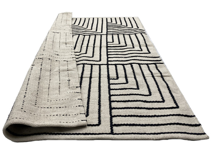 KEVO - Tapis rectangulaire en coton avec motifs beiges et noirs 120 x 180 cm